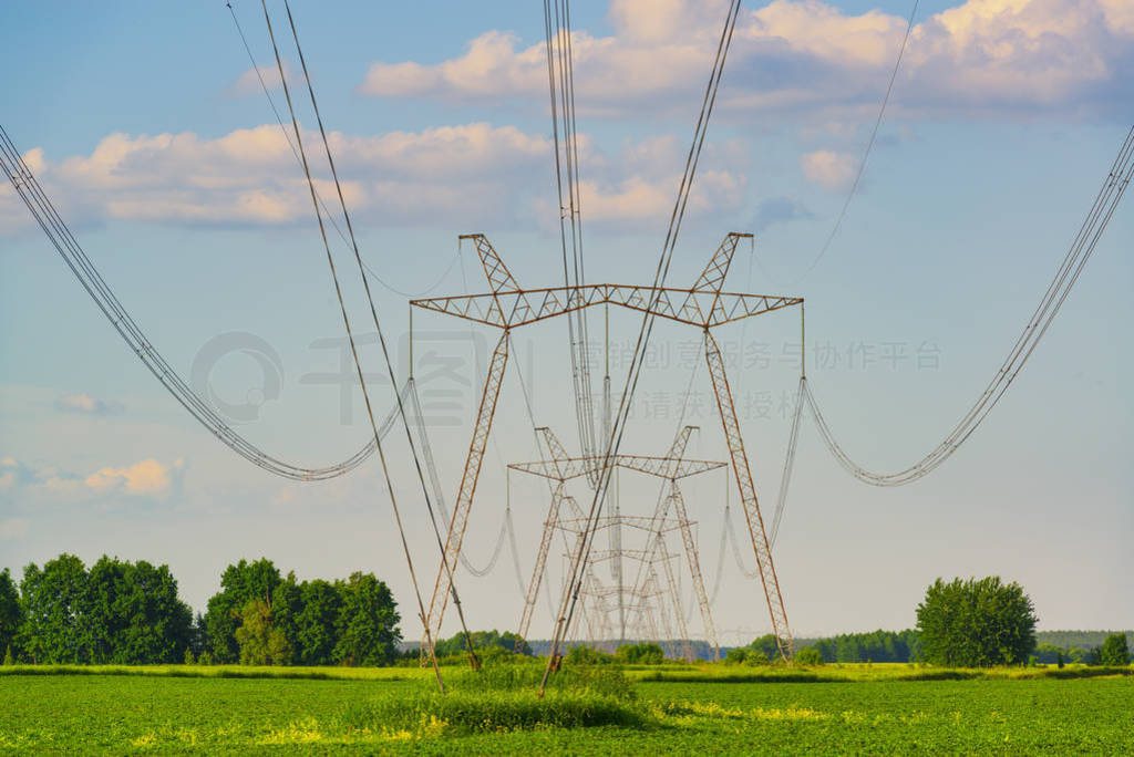 Row of power line supports.