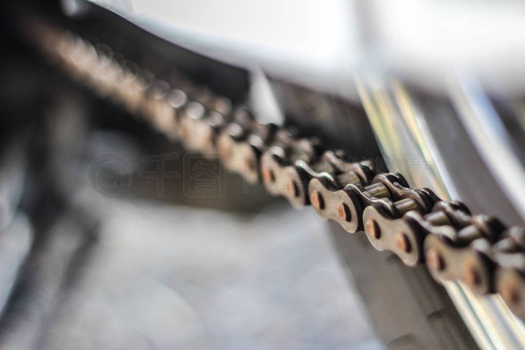 close up of old motorcycle chain with rust