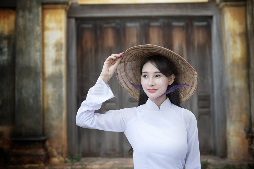 Beautiful woman with Vietnam culture traditional dress, Ao dai,
