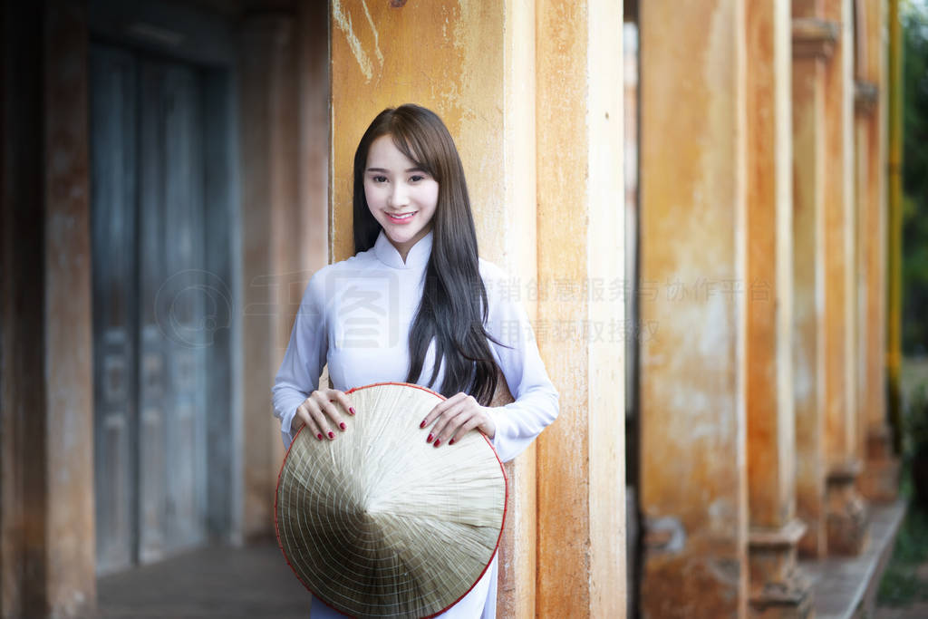 Beautiful woman with Vietnam culture traditional dress, Ao dai,
