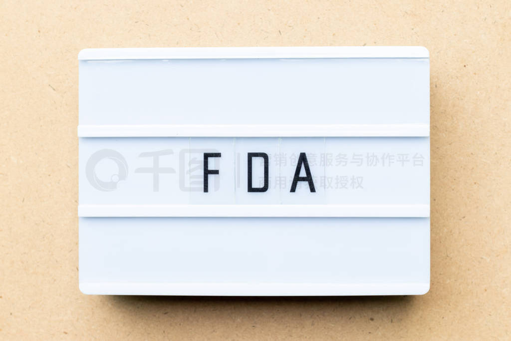 White lightbox with word FDA (abbreviation of food and drug admi