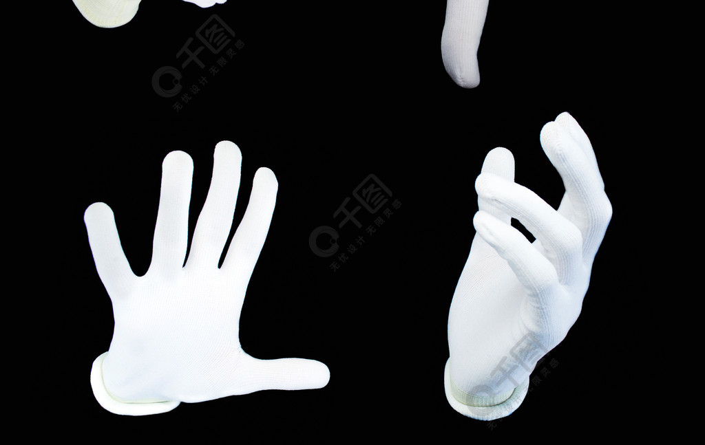 人类的手,在黑色背景上的白手套一套