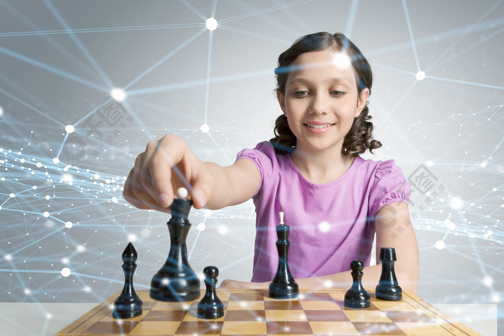 国际象棋游戏,聪明的头脑下棋的年轻白人孩子女孩