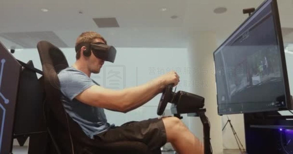 Man racing in VR headset