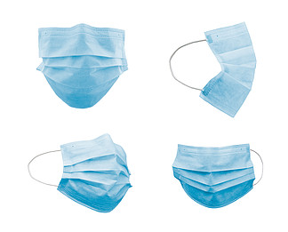 在白色上隔离的不同角度的蓝色医用口罩的集合。