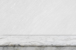 从空的白色大理石桌面的抽象背景用于显示。从空的白色大理石桌面的抽象背景显示产品广告与白色混凝土背景。图片用于<i>添</i>加短信。设计艺术作品的背景。