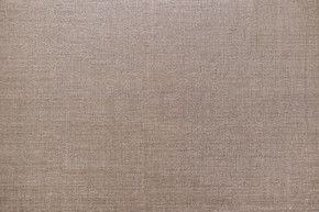 桌布图案表面纹理的棕色亚麻织物。设计装饰背景室内材料特写