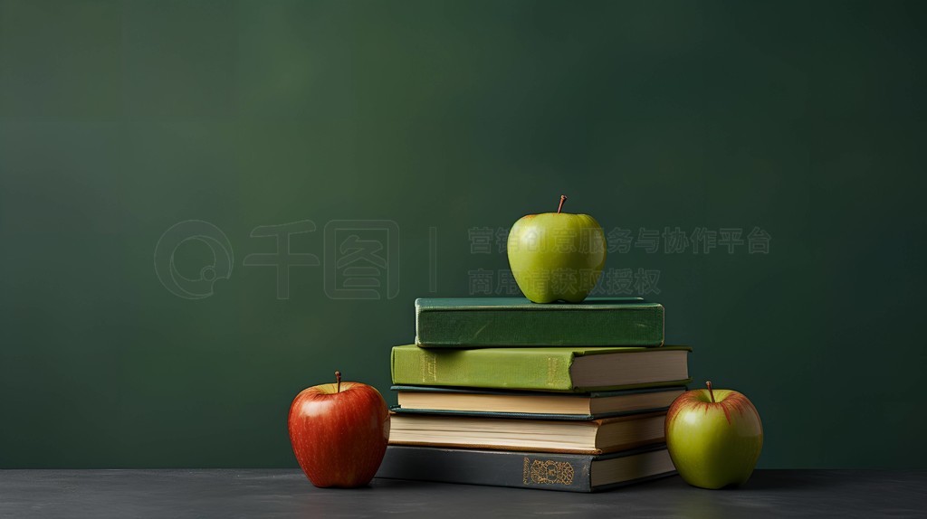 一摞书上放着一颗苹果教育理念ppt背景摄影图