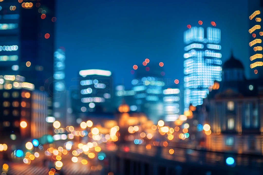 bokeh image of night view of tokyo station illuminated with blue sky, chiyoda ward, japan. - city 