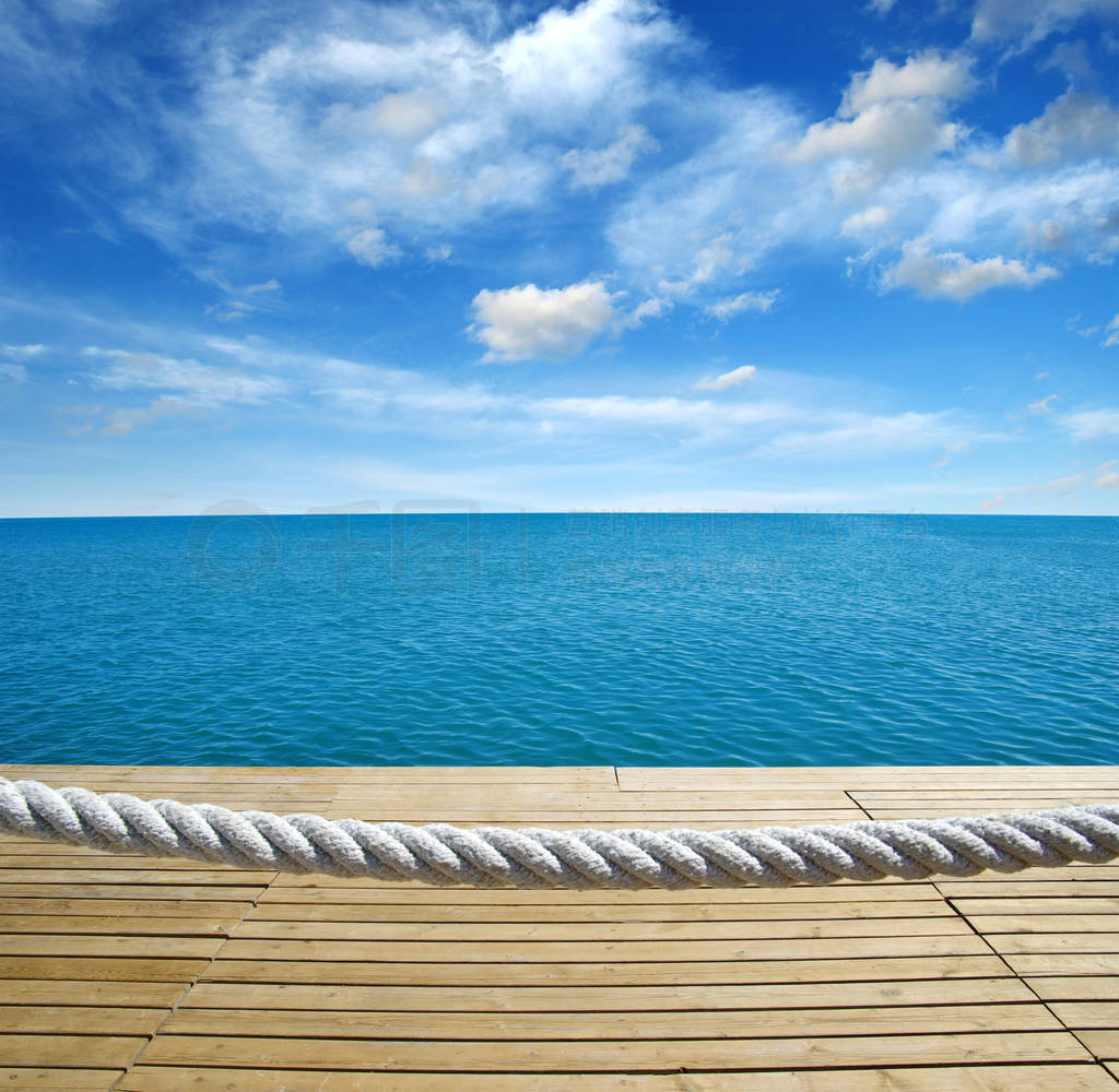 Wood, blue sea and sky