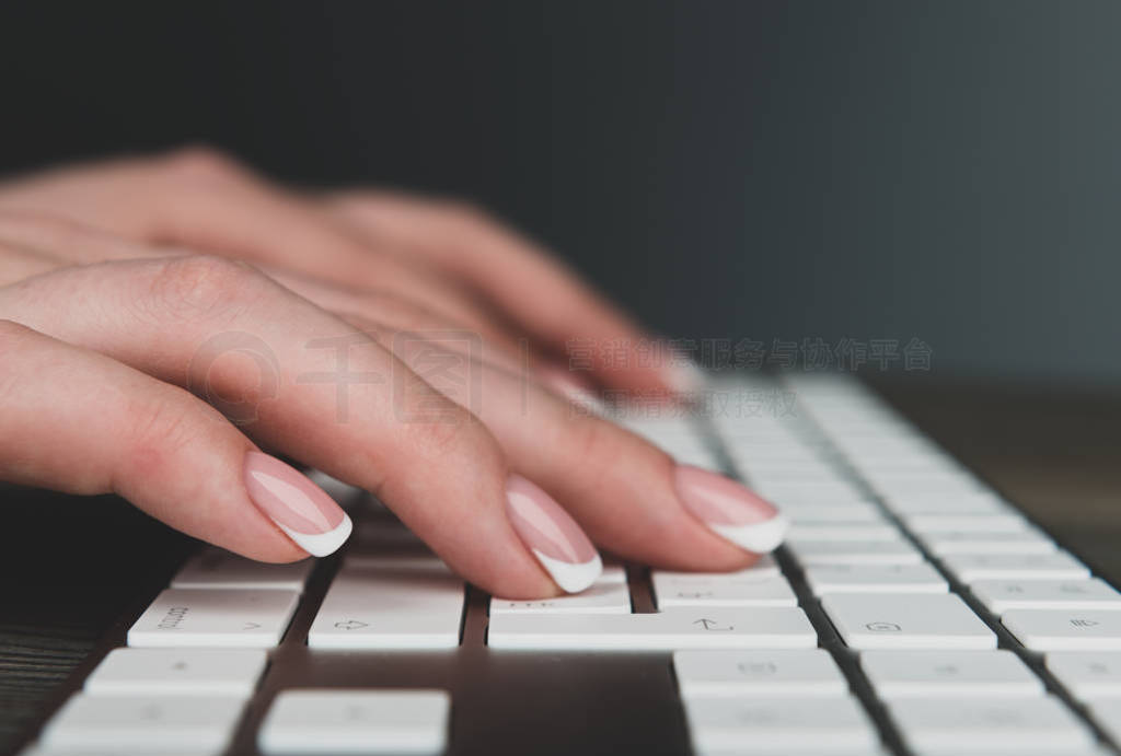 typing female hands on keyboard