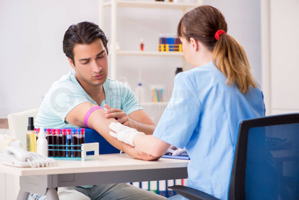 Young patient during blood test sampling procedure