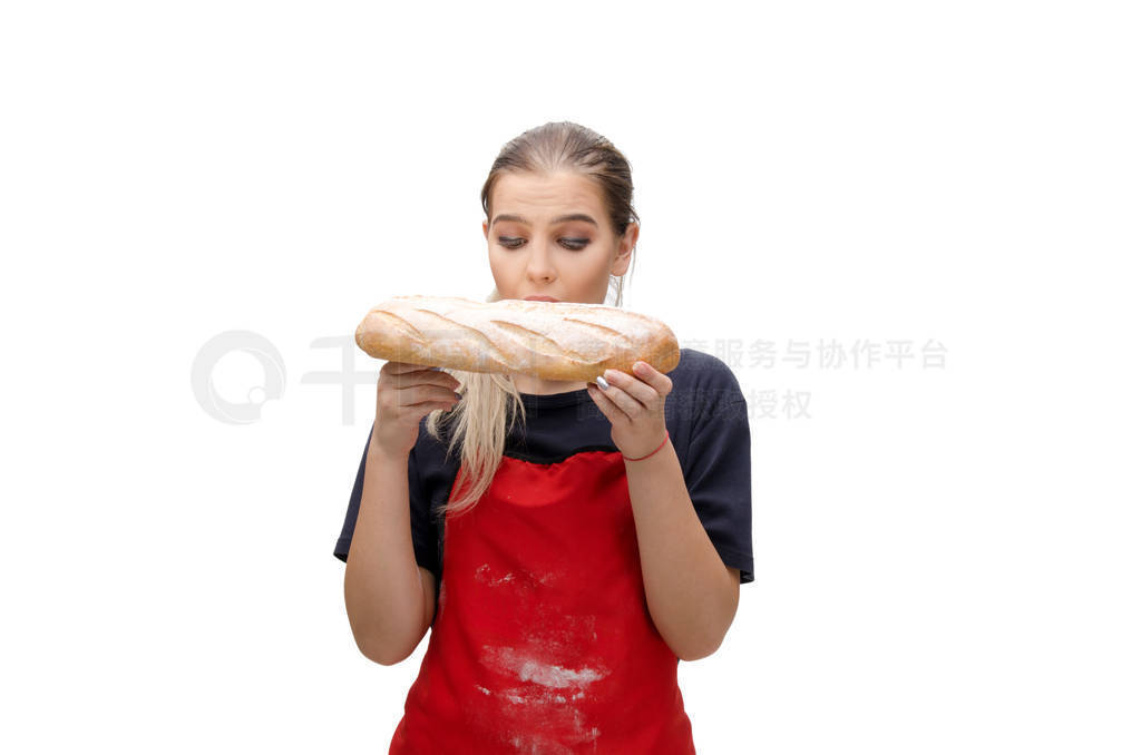 Young female baker isolated on white