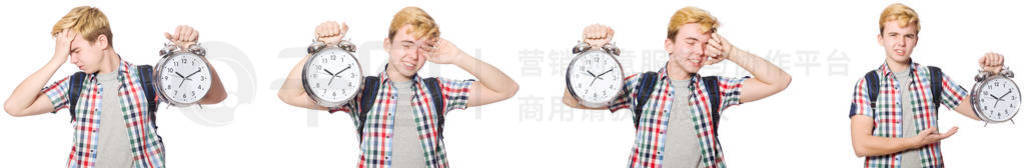 Young boy with alarm-clock in time management concept