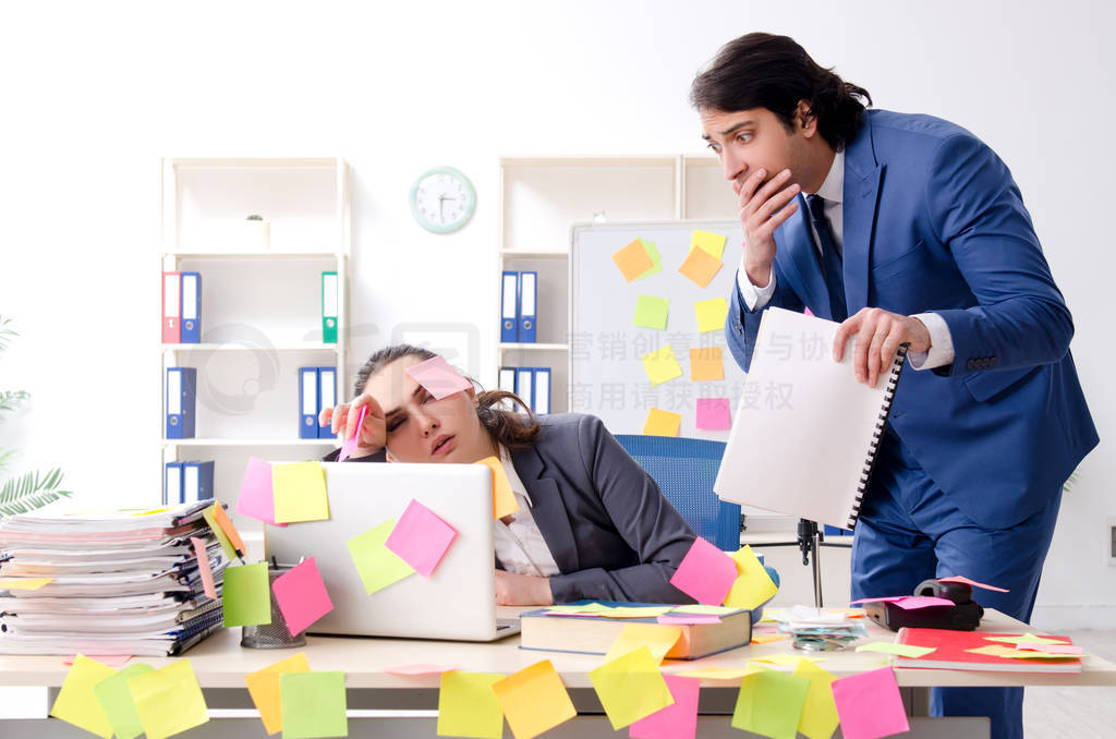 Two colleagues employees working in the office