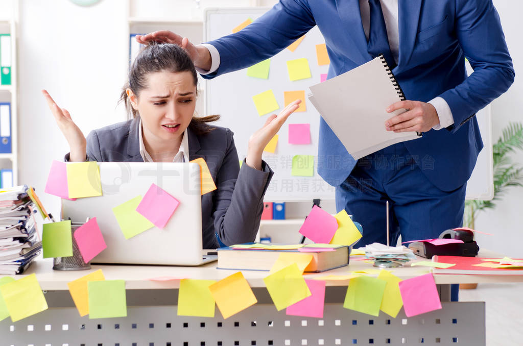 Two colleagues employees working in the office