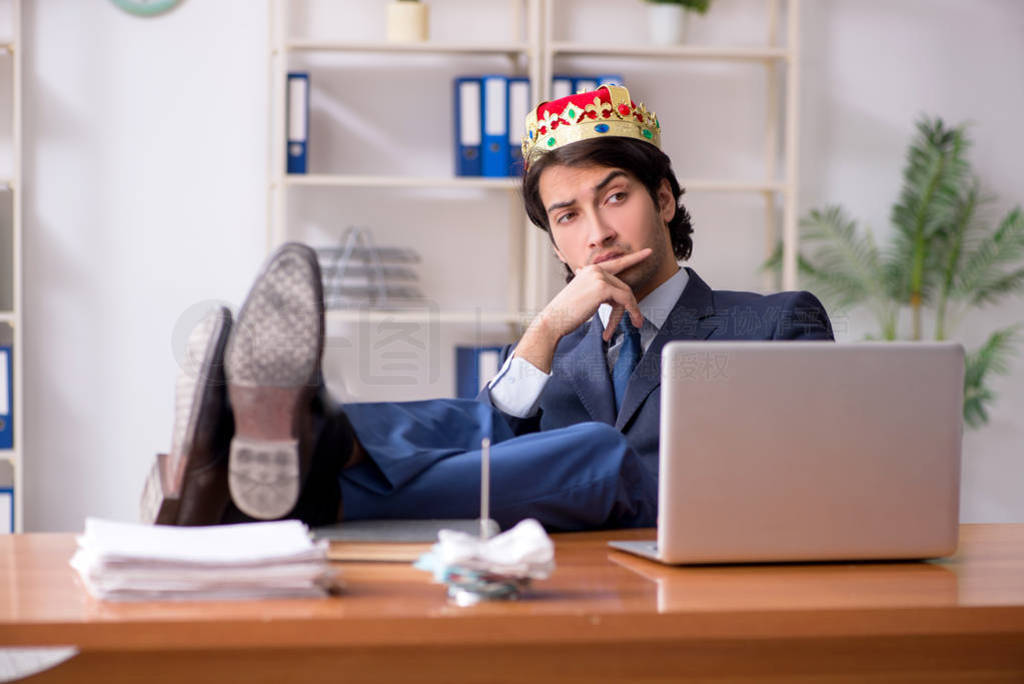Young king businessman working in the office