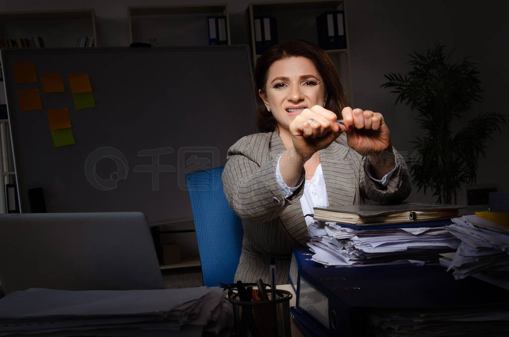 Female employee suffering from excessive work