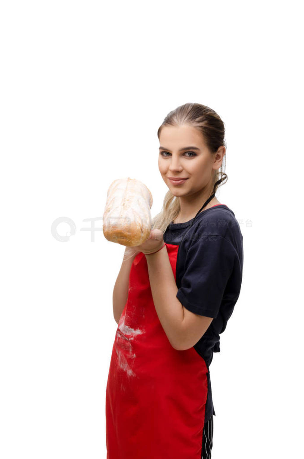 Young female baker isolated on white