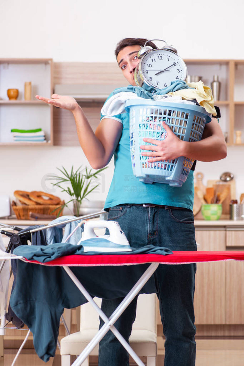 Young man husband doing clothing ironing at home