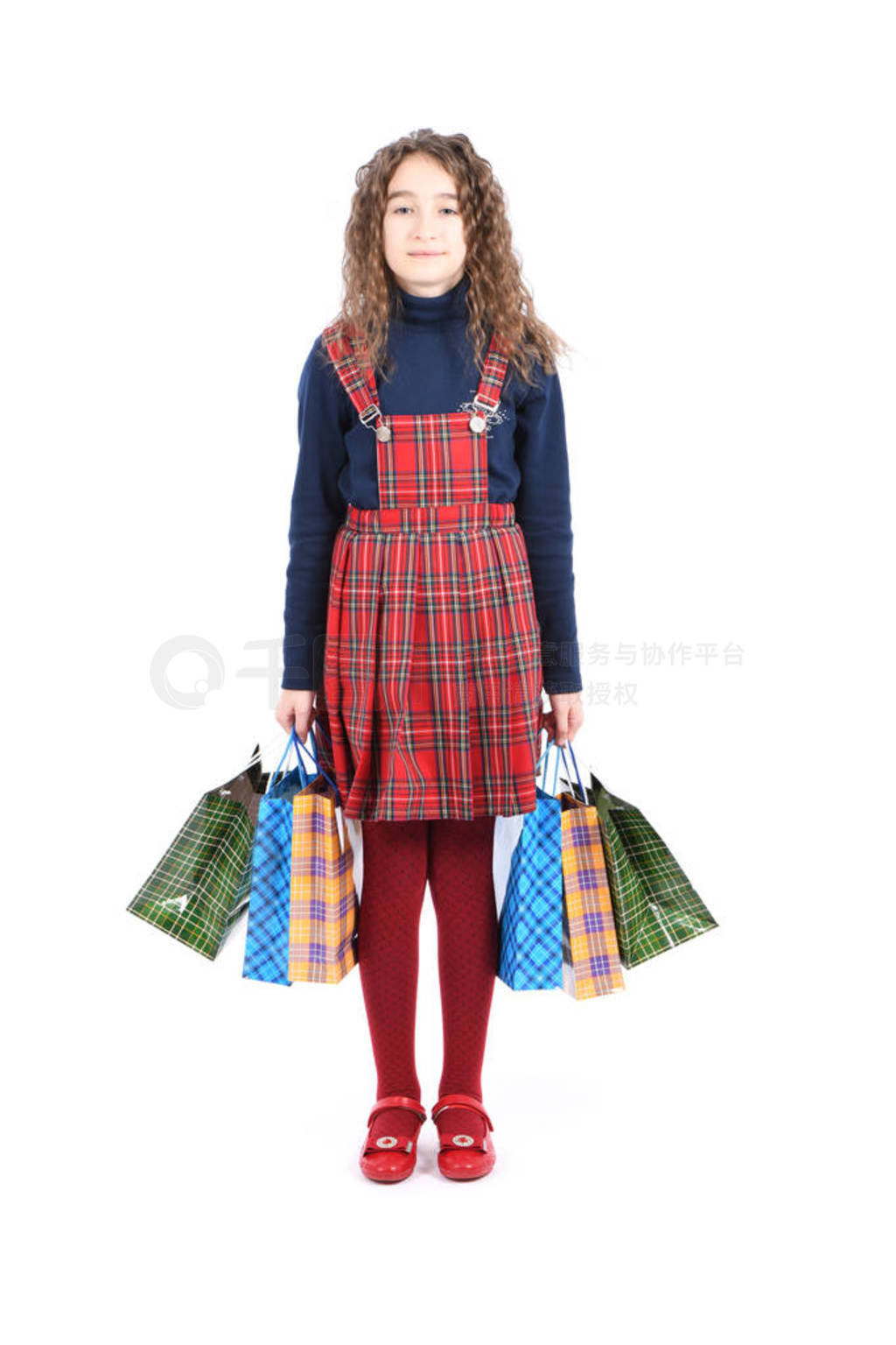 Child with a packaging checkered texture isolated on white backg