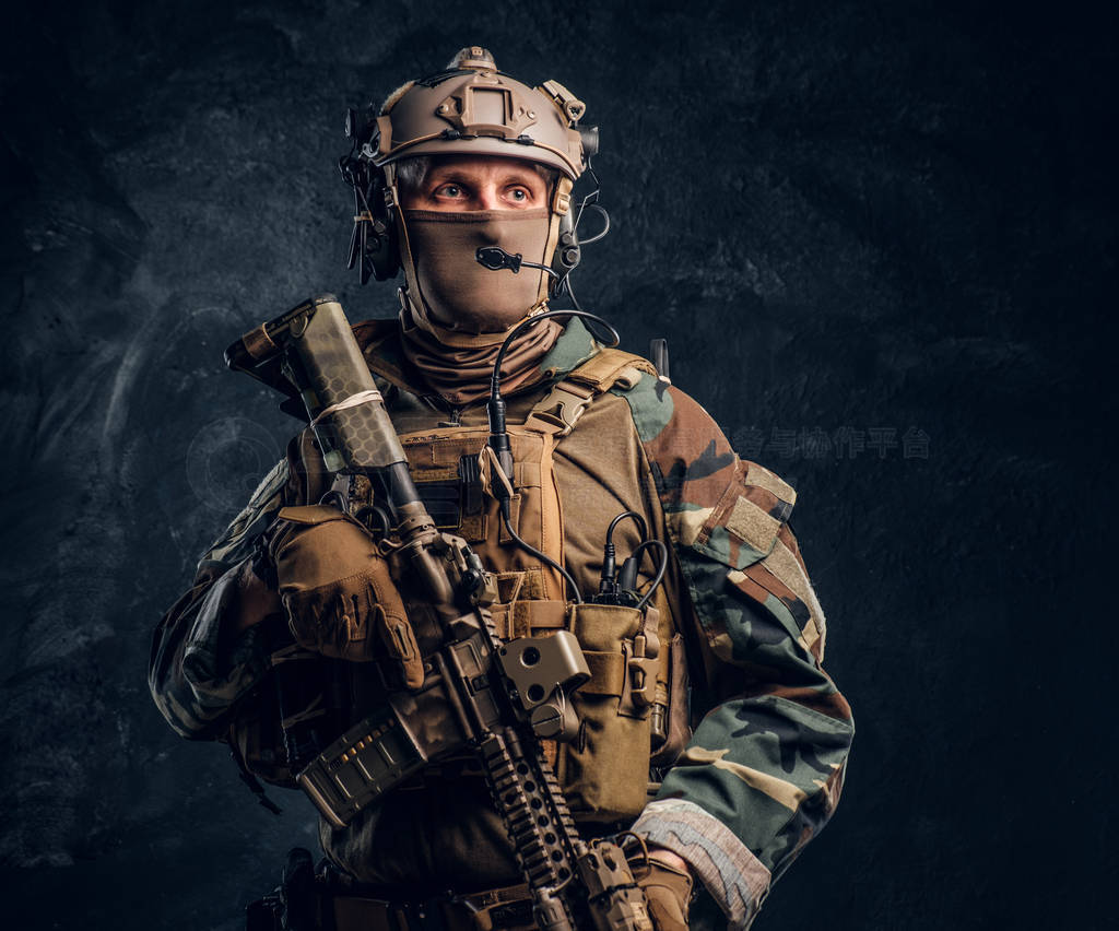 Elite unit, special forces soldier in camouflage uniform posing