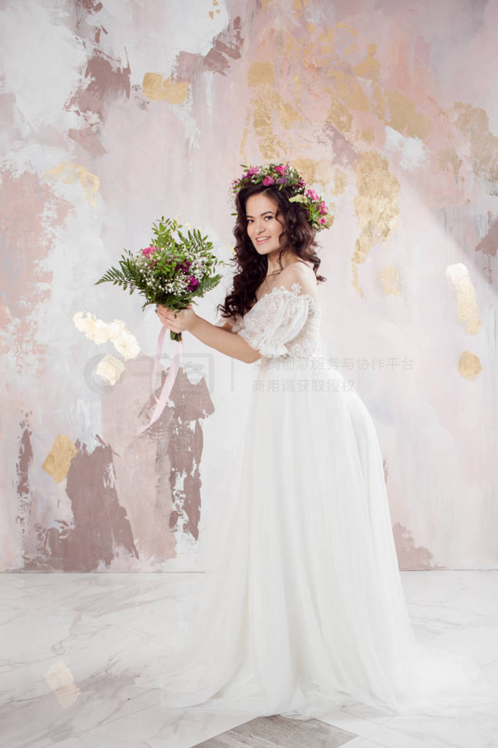 Elegant brunette girl bride with flowers. Beautiful young bride