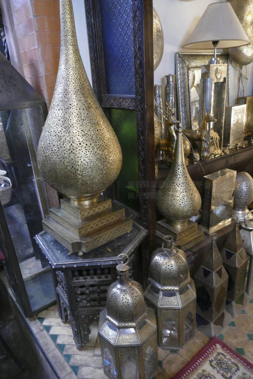 Filigree metal lamps in a shop in the medina