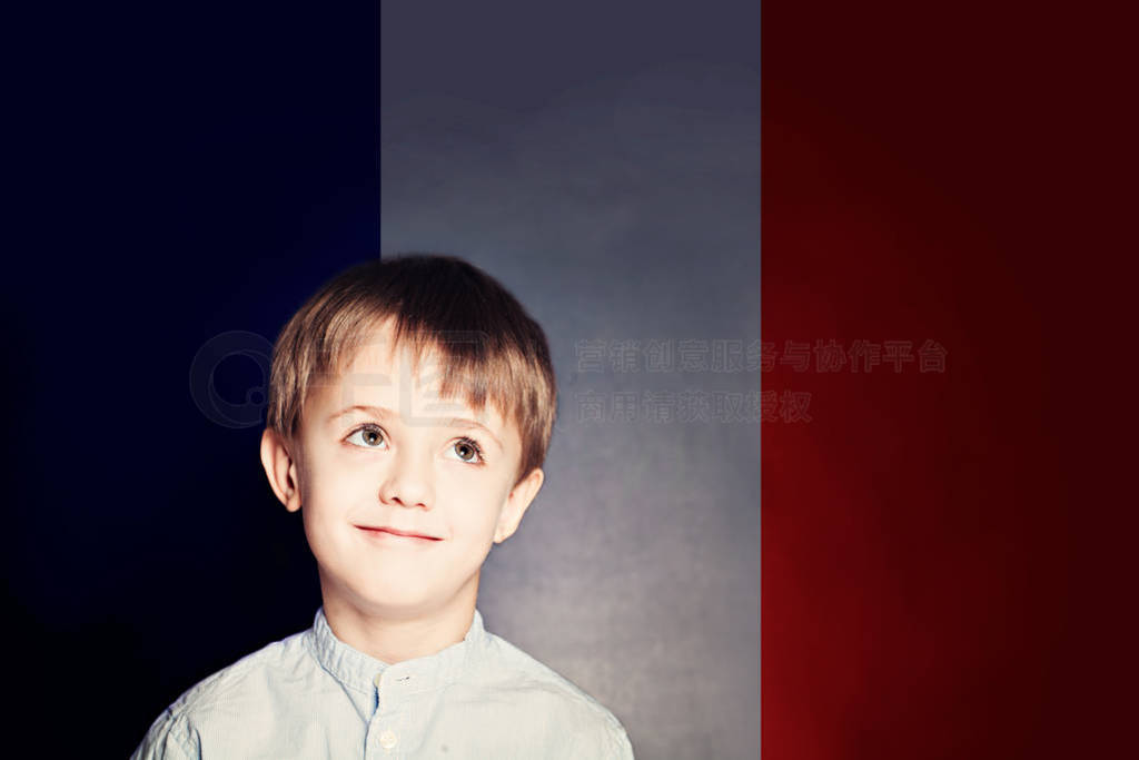 Learn french language concept. Happy child student with flag