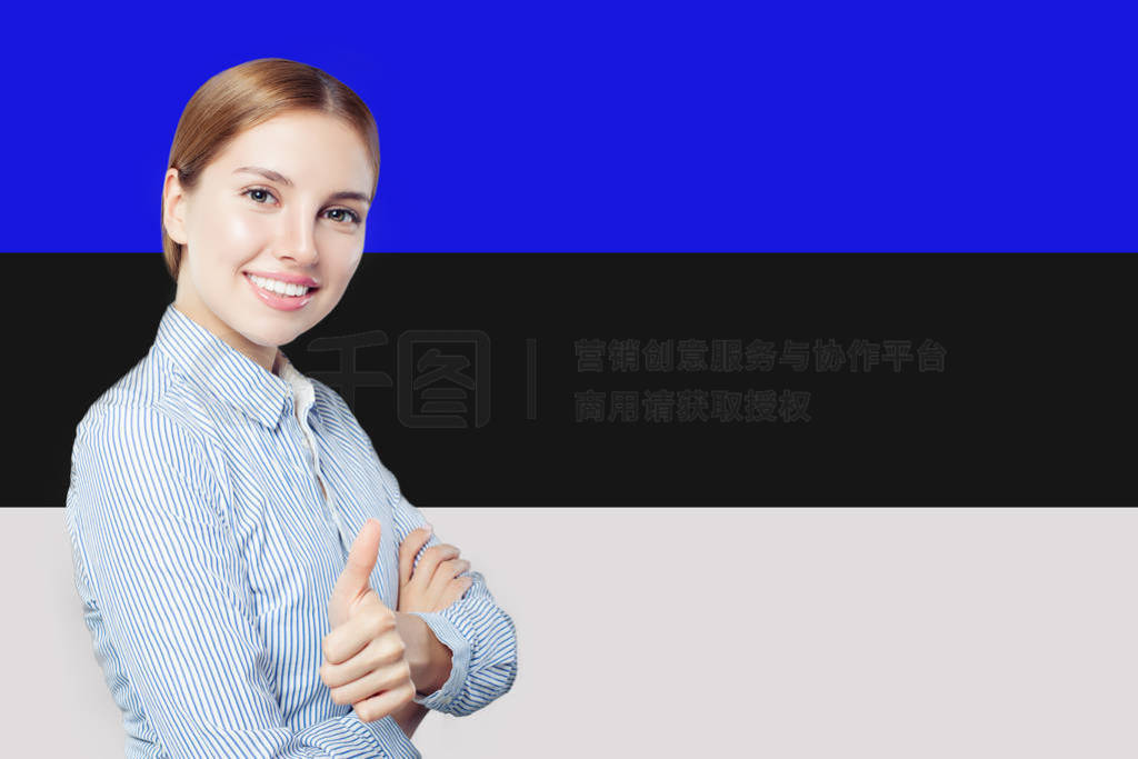 Estonia. Happy cute girl showing thumb up and smiling