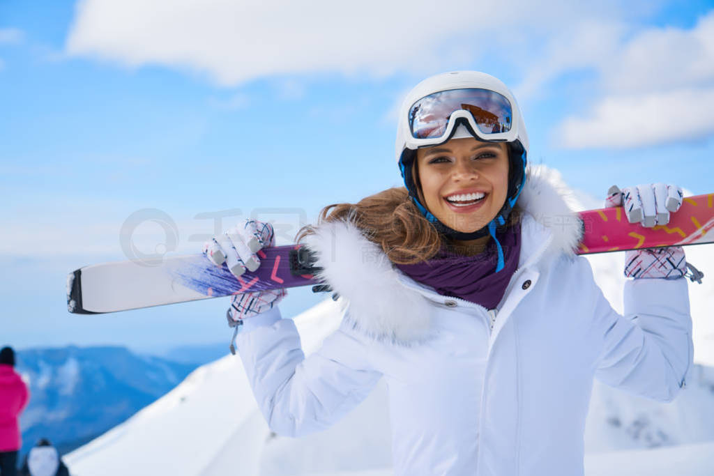 Young caucasian woman skier . Winter sports and leasur