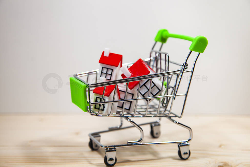 Shopping cart and houses.