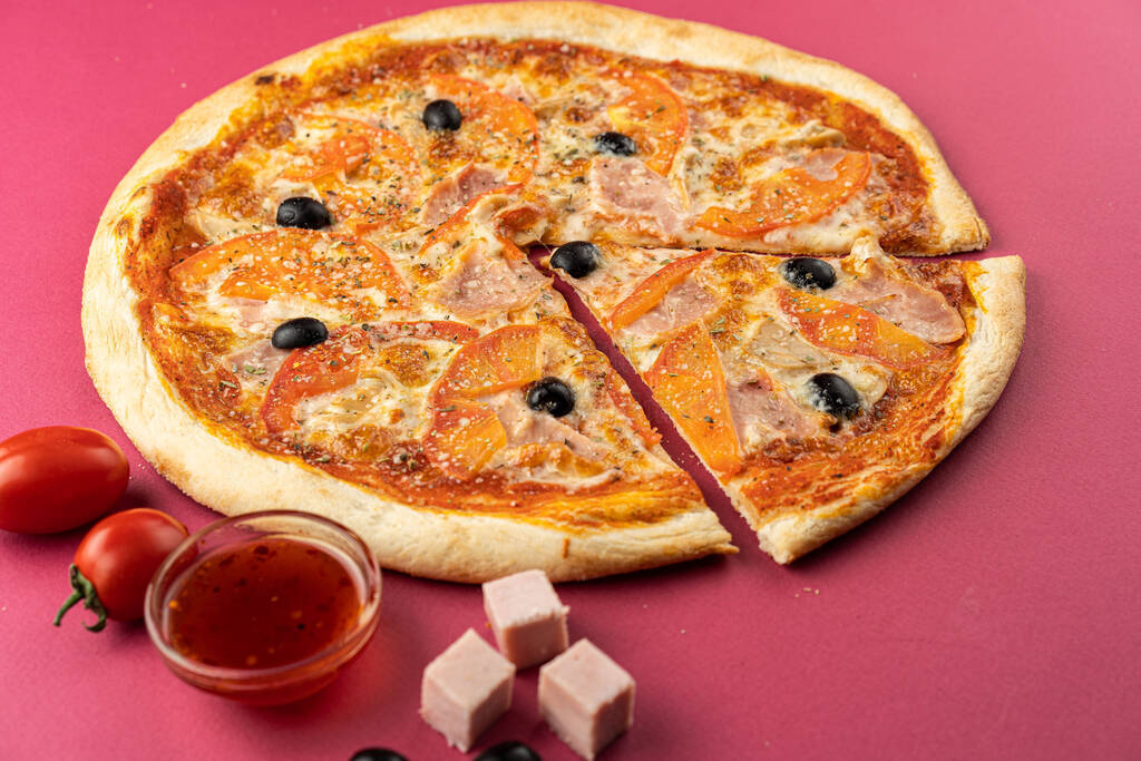 pizza close-up, isolated, against a colored background. whole pi