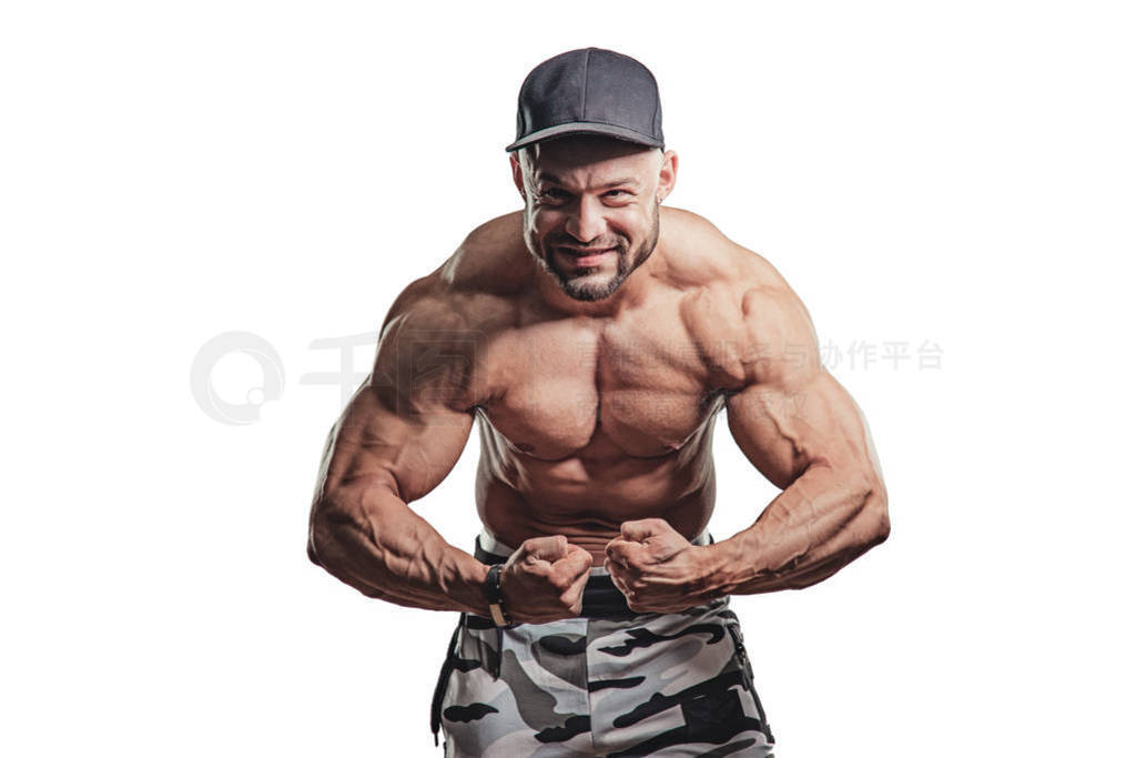 Man bodybuilder showing muscular body. Fitness and bodybuilding