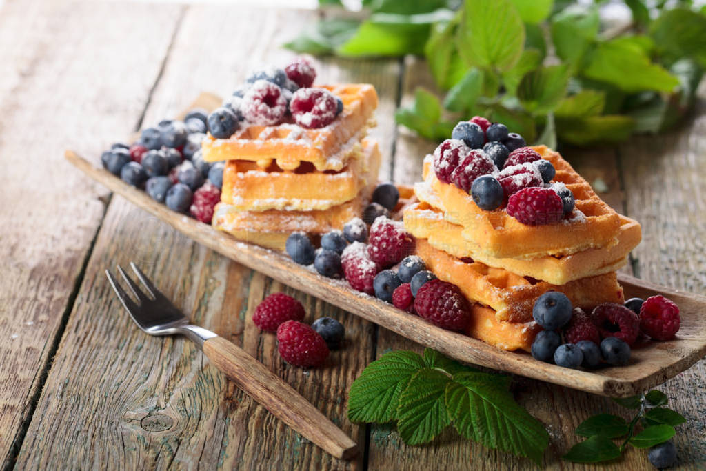 Yummy sweet waffles with berries.