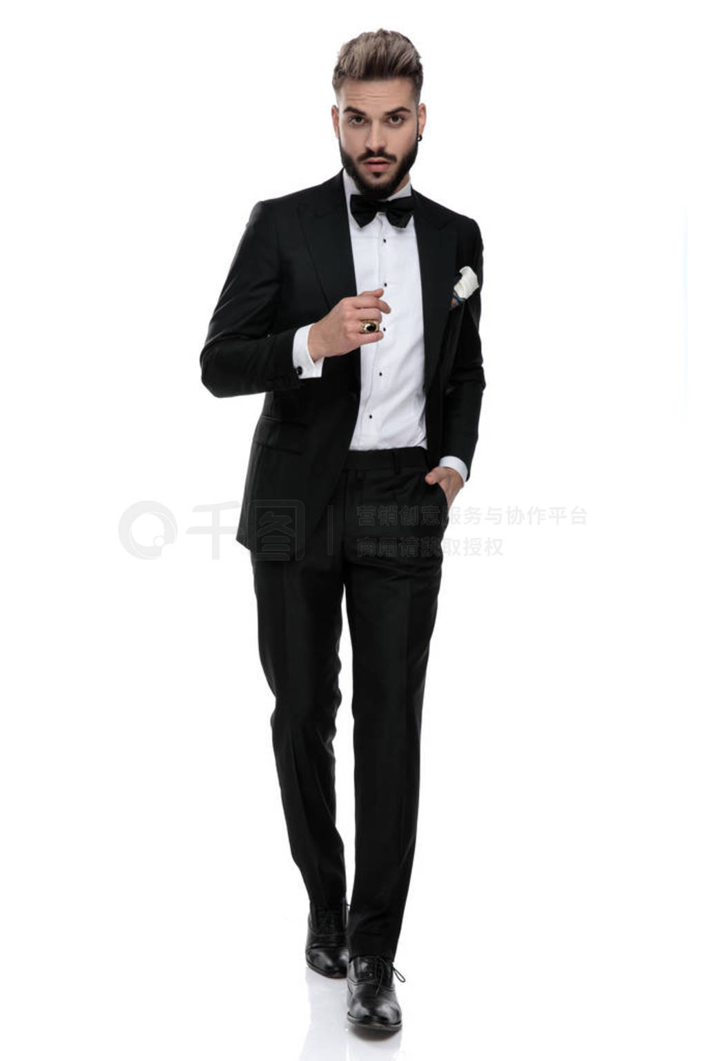 businessman walking with hand in pocket and a cool attitude