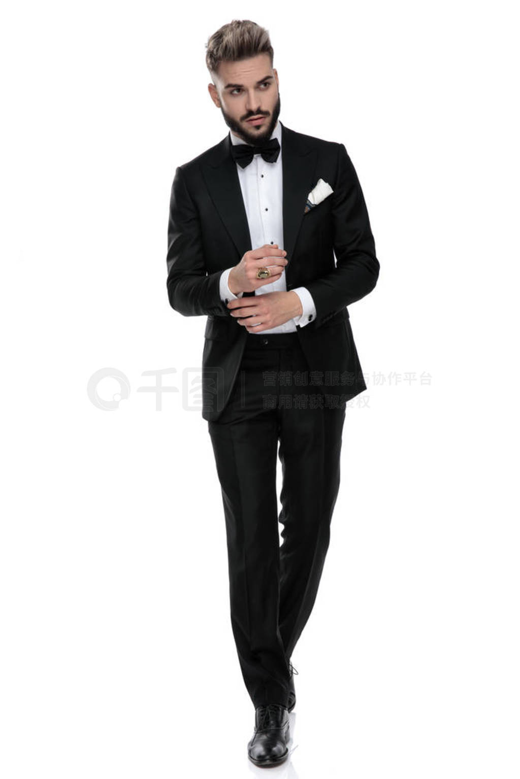 businessman walking while fixing sleeve cool