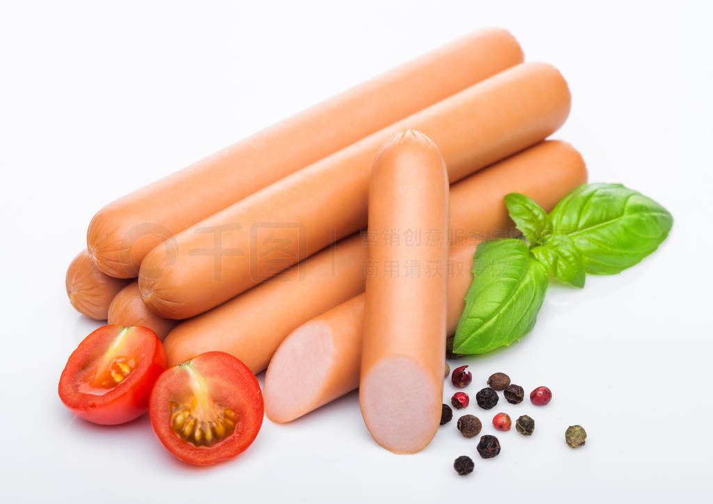 Classic boiled meat pork sausages with pepper and basil and cher