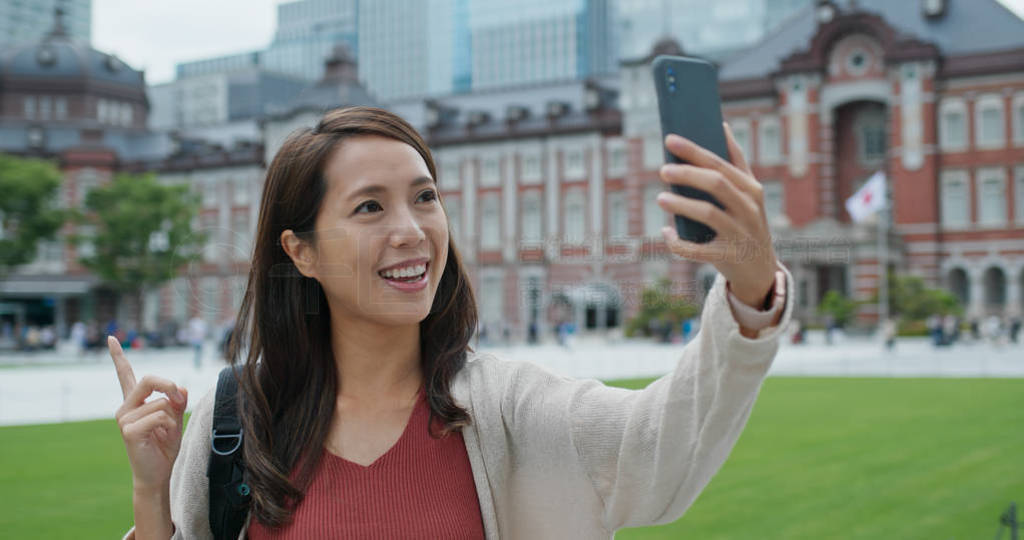 Woman take selfie on cellphone