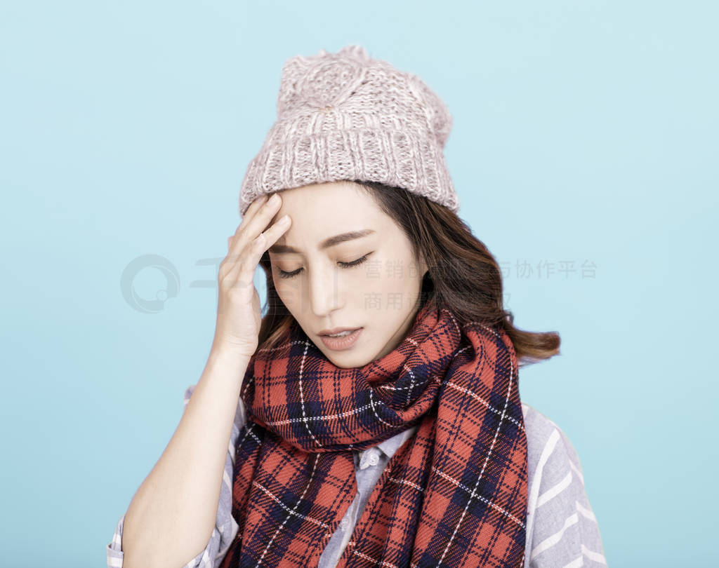 Sick young woman with headache