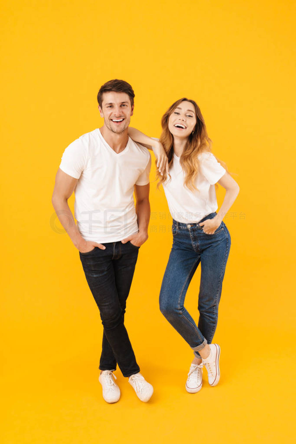 Full length portrait of beautiful couple man and woman in basic