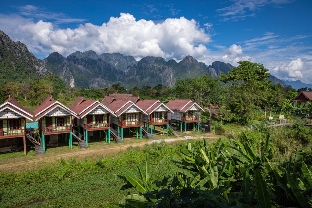 Village and mountain in Vang Vieng, Laos Southeast Asia.