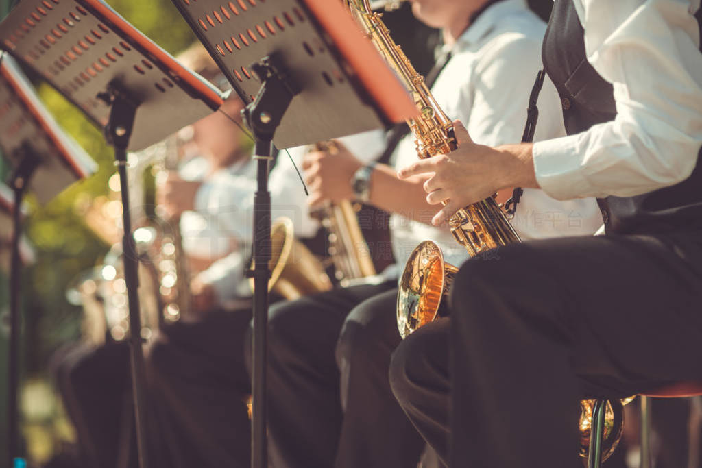 Jazz musicians playing the saxophone