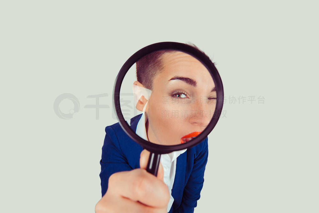 Bad vision. Woman business girl with magnifying glass lens tryin