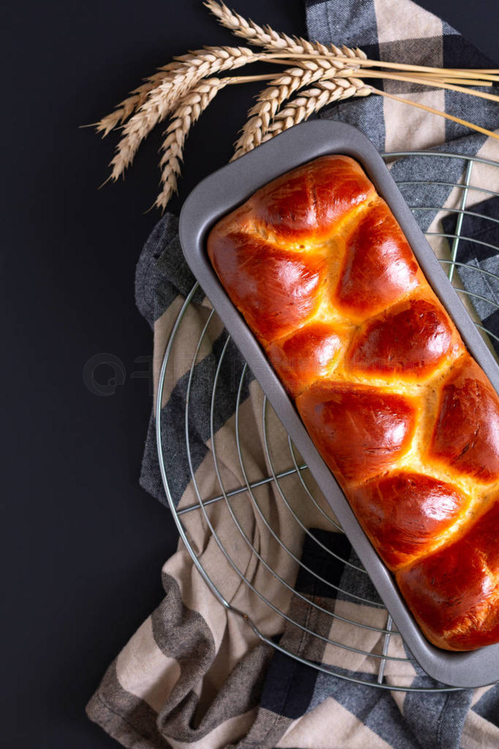 Food bakery concept Fresh baked brioche Braided Bread loaf with