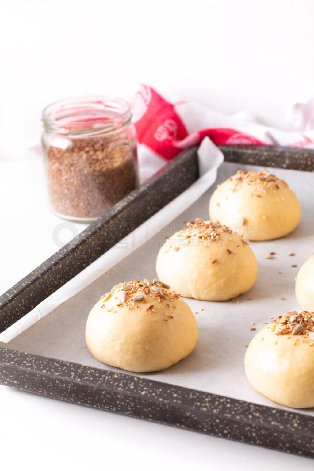 Food concept Proving, Proofing yeast dough of hamburger buns in