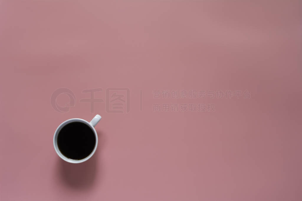 Top view of coffee on pink background and copy space for insert