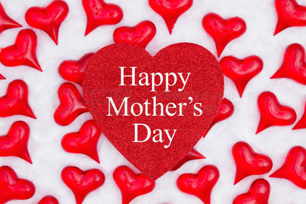 Happy Mother's Day greeting on glitter heart with red hearts on