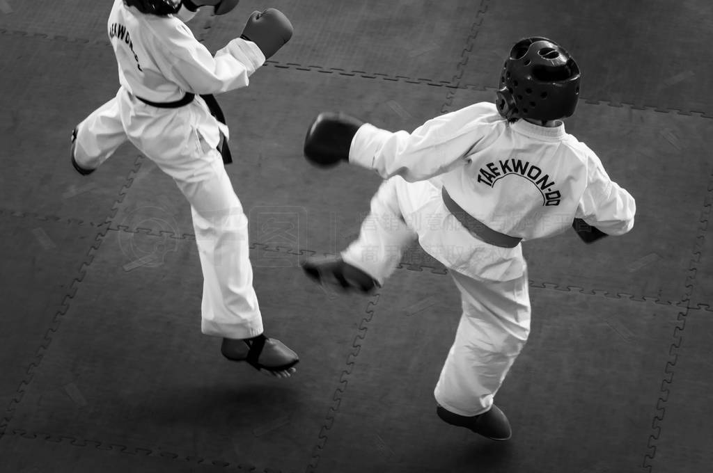 Martial Arts - Taekwondo. Kids in traditional kimano, hard hats