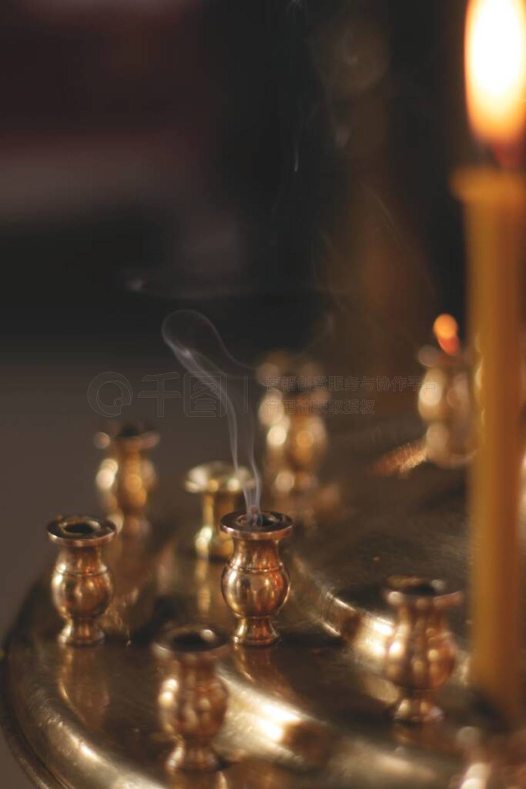 A close up of smoke in a candlestick